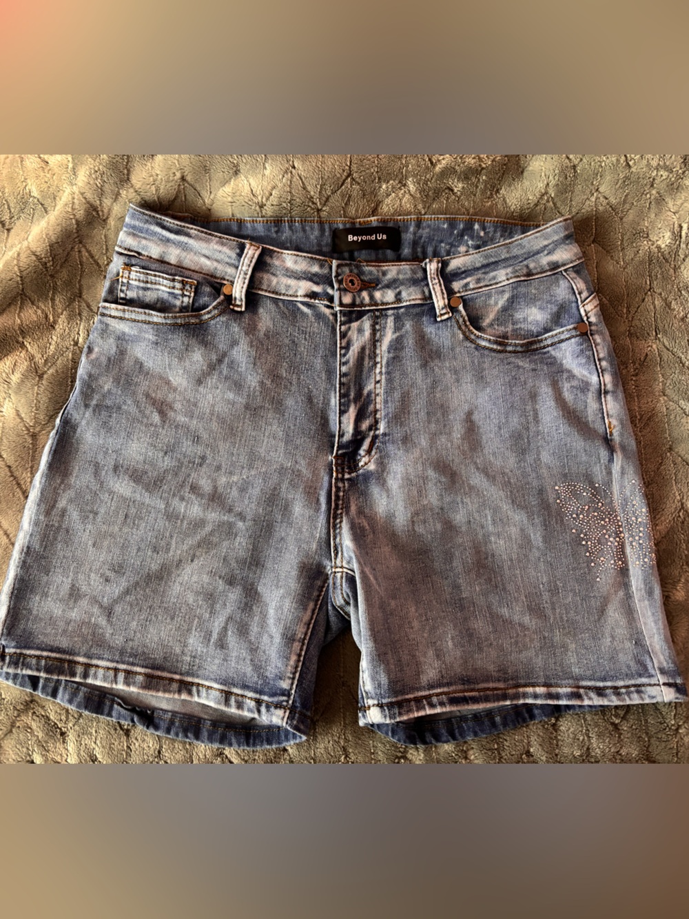 Beyond US denim shorts with a beaded butterfly on the side